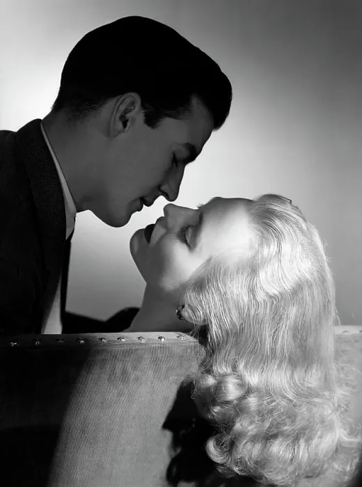 Framed Print : 1940S 1950S Movie Star Studio Style Romantic Couple Embracing On Sofa About To Kiss Husband Silhouette Wife Long Blond Framed Print : 1940S 1950S Movie Star Studio Style Romantic Couple Embracing On Sofa About To Kiss Husband Silhouette Wife Long Blond