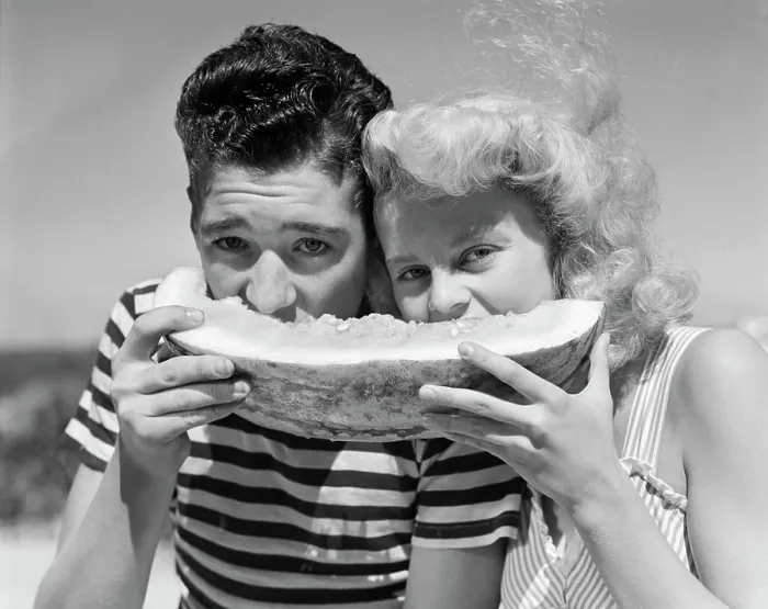 Framed Print : 1940S 1950S Teen Age Boy & Girl Eating Slice Watermelon