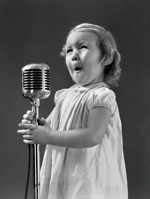 Framed Print : 1940S Little Girl Making Face Singing Into Microphone Framed Print : 1940S Little Girl Making Face Singing Into Microphone