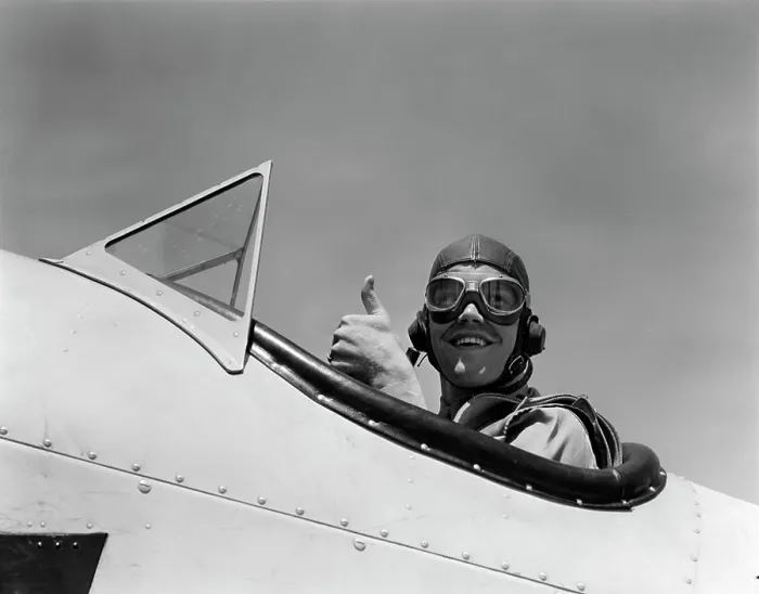 Framed Print : 1940S Smiling Army Air Corps Pilot In Open Cockpit Wearing A Leather Flying Helmet Giving A Thumbs-Up Sign