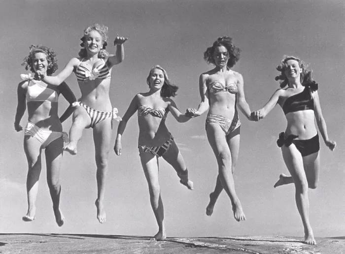 Framed Print : 1940s summer. A group of young women in their bikinis are happy on this summer's day Framed Print : 1940s summer. A group of young women in their bikinis are happy on this summer's day
