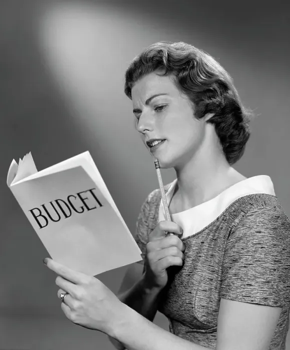 Framed Print : 1940S Woman Holding Budget Book With Pencil To Chin Framed Print : 1940S Woman Holding Budget Book With Pencil To Chin