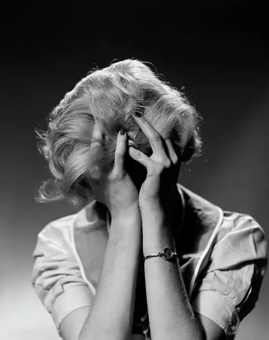 Framed Print : 1950S Blond Woman With Headache Holding Head In Hands Framed Print : 1950S Blond Woman With Headache Holding Head In Hands