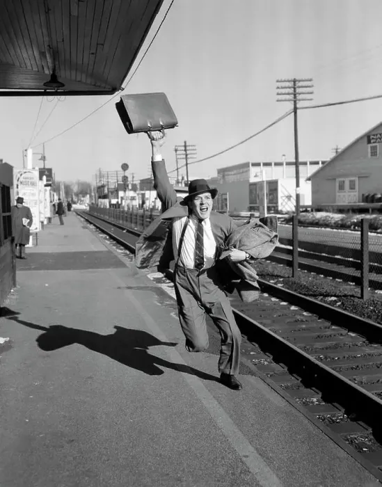 Framed Print : 1950S Businessman With Briefcase In Air Running After Departing Train