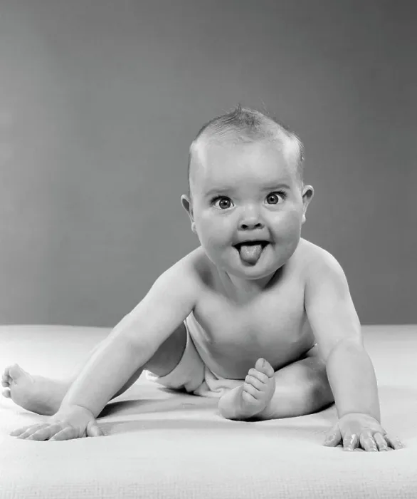 Framed Print : 1950S Portrait Of Baby Sitting And Sticking Tongue Out Indoor Framed Print : 1950S Portrait Of Baby Sitting And Sticking Tongue Out Indoor