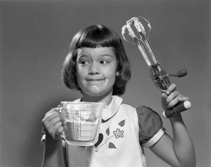 Framed Print : 1950S Smiling Girl Holding Measuring Cup Egg Beaters Cooking Mixing Food On Face Framed Print : 1950S Smiling Girl Holding Measuring Cup Egg Beaters Cooking Mixing Food On Face