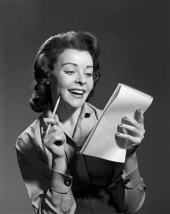 Framed Print : 1950S Smiling Young Woman Holding Pencil And Steno Notepad Framed Print : 1950S Smiling Young Woman Holding Pencil And Steno Notepad