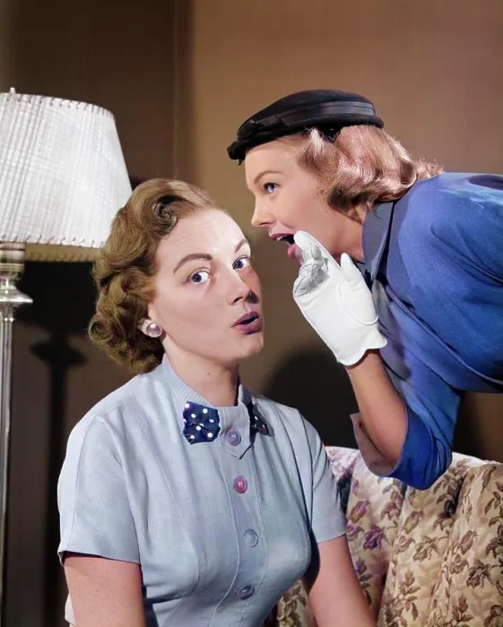 Framed Print : 1950s WOMAN IN HAT & WHITE GLOVES LEANING DOWN TO WHISPER GOSSIP TO FRIEND Framed Print : 1950s WOMAN IN HAT & WHITE GLOVES LEANING DOWN TO WHISPER GOSSIP TO FRIEND