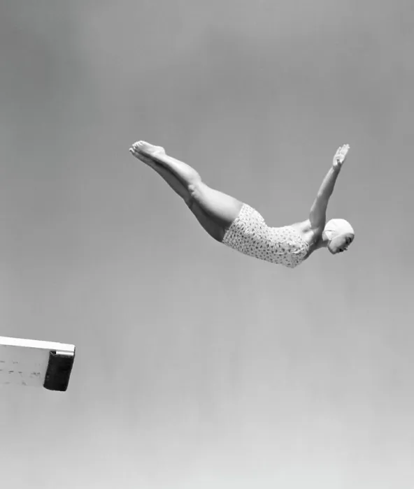 Framed Print : 1950S Woman Swan Dive Off Diving Board One Piece Bathing Suit Cap Framed Print : 1950S Woman Swan Dive Off Diving Board One Piece Bathing Suit Cap