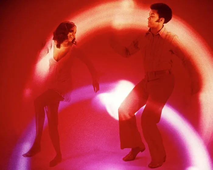 Framed Print : 1960s 1970s AFRICAN AMERICAN COUPLE MAN WOMAN DANCING SHIRT RED TROUSERS SILVER DRESS AFRO HAIR STYLE BELLBOTTOMS Framed Print : 1960s 1970s AFRICAN AMERICAN COUPLE MAN WOMAN DANCING SHIRT RED TROUSERS SILVER DRESS AFRO HAIR STYLE BELLBOTTOMS