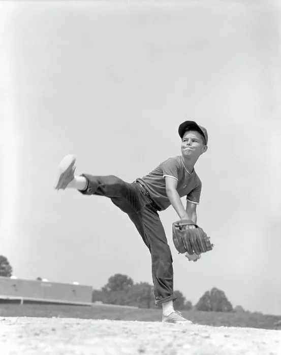 Framed Print : 1960S Boy Wearing Baseball Cap Tee Shirt Blue Jeans And Determined Expression In Wind-Up To Deliver Pitch Framed Print : 1960S Boy Wearing Baseball Cap Tee Shirt Blue Jeans And Determined Expression In Wind-Up To Deliver Pitch