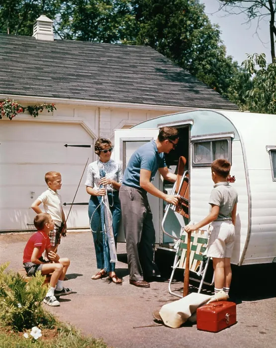 Framed Print : 1960S Family Loading Camping Trailer For Vacation Framed Print : 1960S Family Loading Camping Trailer For Vacation