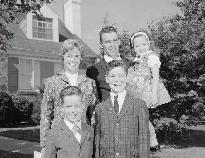 Framed Print : 1960S Family Portrait Father Mother Two Sons And Daughter In Front Of Suburban House