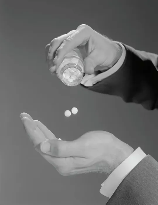 Framed Print : 1960S Male Hands Shaking Two Aspirins Pills From Bottle Framed Print : 1960S Male Hands Shaking Two Aspirins Pills From Bottle