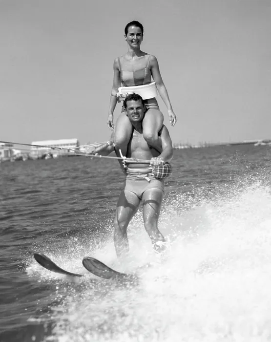 Framed Print : 1960S Man Water Skiing With Woman In Bathing Suit Riding On Shoulders Framed Print : 1960S Man Water Skiing With Woman In Bathing Suit Riding On Shoulders
