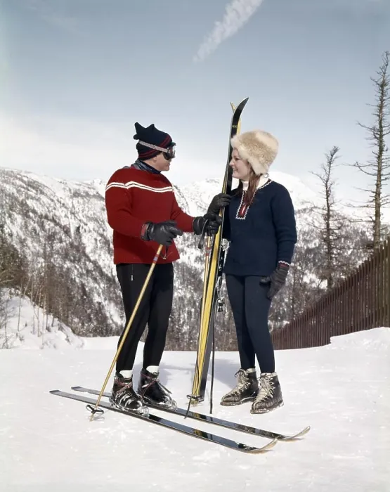 Framed Print : 1960s SMILING COUPLE MAN WOMAN TALKING ON MOUNTAIN SKI SLOPE WEARING SKI GEAR Framed Print : 1960s SMILING COUPLE MAN WOMAN TALKING ON MOUNTAIN SKI SLOPE WEARING SKI GEAR