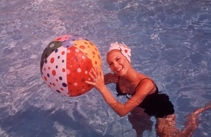 Framed Print : 1960S Woman In Swimming Pool Holding Beach Ball Framed Print : 1960S Woman In Swimming Pool Holding Beach Ball