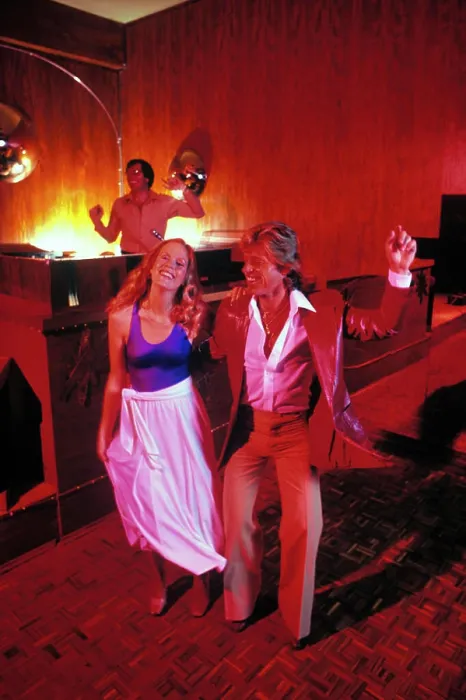 Framed Print : 1970s BLONDE COUPLE ON DISCO DANCE FLOOR DOING THE HUSTLE WOMAN WEARING SPANDEX TOP MAN IN LEATHER JACKET DJ IN Framed Print : 1970s BLONDE COUPLE ON DISCO DANCE FLOOR DOING THE HUSTLE WOMAN WEARING SPANDEX TOP MAN IN LEATHER JACKET DJ IN