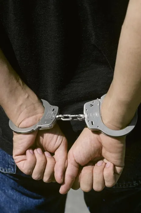 Framed Print : 1990s CLOSE-UP OF ANONYMOUS MALE HANDS IN HANDCUFFS Framed Print : 1990s CLOSE-UP OF ANONYMOUS MALE HANDS IN HANDCUFFS