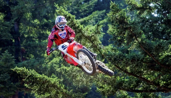 Framed Print : 2008 Honda CRF 450R with rider Ivan Tedesco on dirt track course in forest, mid air jump Framed Print : 2008 Honda CRF 450R with rider Ivan Tedesco on dirt track course in forest, mid air jump