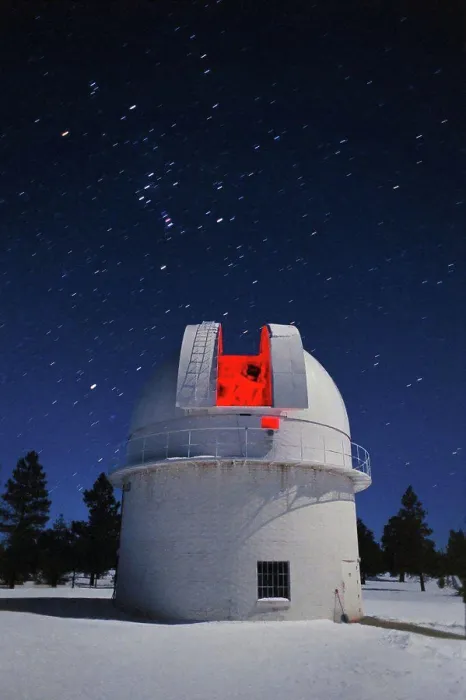 Framed Print : The 42' telescope glows softly red in this time exposure of the dome illuminated by a partial moon Framed Print : The 42' telescope glows softly red in this time exposure of the dome illuminated by a partial moon