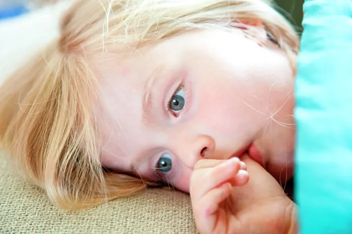 Framed Print : 5 years old girl sucking her thumb