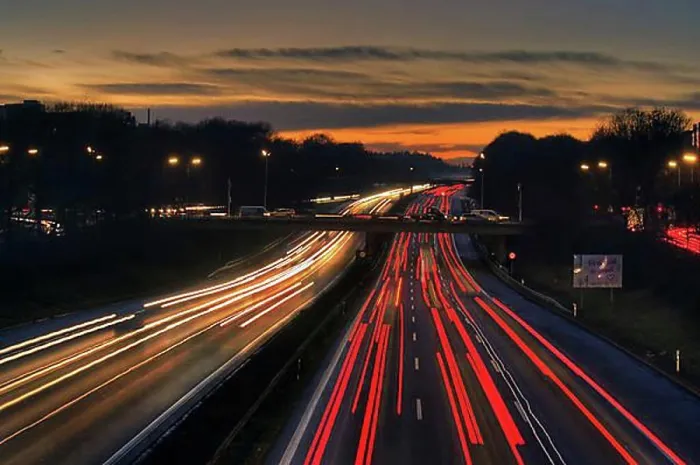Framed Print : A96 motorway at dusk with light trails of moving cars, Munich, Bavaria, Germany, Europe Framed Print : A96 motorway at dusk with light trails of moving cars, Munich, Bavaria, Germany, Europe