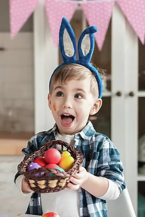 Framed Print : Adorable little boy holding basket with easter eggs Framed Print : Adorable little boy holding basket with easter eggs