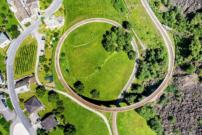 Framed Print : Aerial of the Brusio spiral viaduct, UNESCO World Heritage Site, Rhaetian Railway, Switzerland, Europe Framed Print : Aerial of the Brusio spiral viaduct, UNESCO World Heritage Site, Rhaetian Railway, Switzerland, Europe