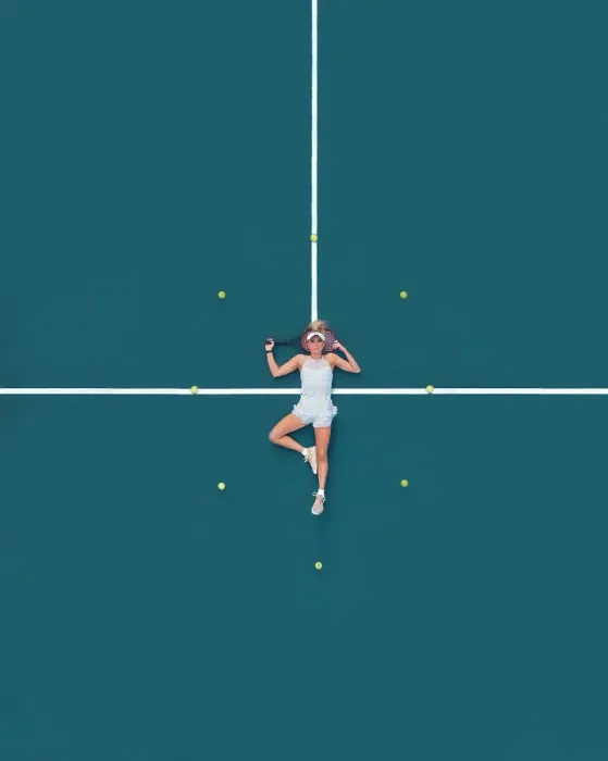 Framed Print : Aerial drone view of a female tennis player laying on a blue tennis court in Melbourne, Victoria, Australia Framed Print : Aerial drone view of a female tennis player laying on a blue tennis court in Melbourne, Victoria, Australia