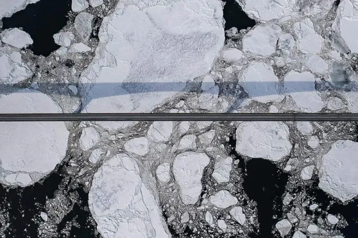 Framed Print : Aerial over Long Bridge and Ice Filled Bay in Canada Framed Print : Aerial over Long Bridge and Ice Filled Bay in Canada