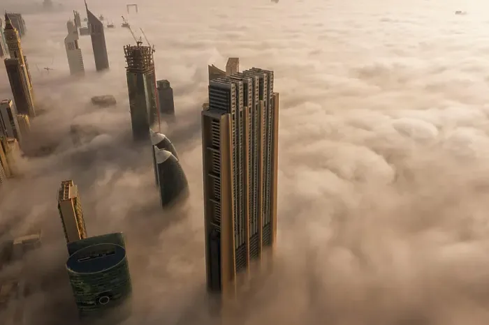 Framed Print : Aerial view of buildings surrounded by clouds Dubai, United Arab Emirates Framed Print : Aerial view of buildings surrounded by clouds Dubai, United Arab Emirates