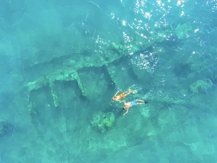 Framed Print : Aerial view of a couple snorkeling on shipwreck in the Gulf of California, Baja California Sur, Mexico Framed Print : Aerial view of a couple snorkeling on shipwreck in the Gulf of California, Baja California Sur, Mexico