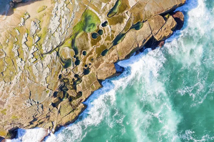 Framed Print : Aerial view above dangerous rock shelf in Sydney's Royal National Park, Australia Framed Print : Aerial view above dangerous rock shelf in Sydney's Royal National Park, Australia