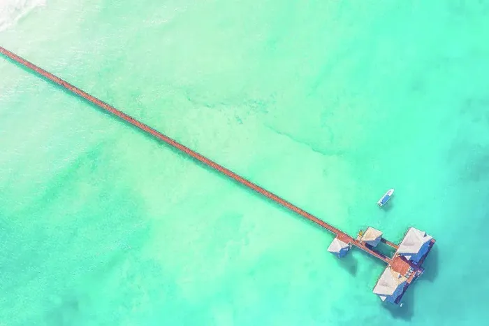 Framed Print : Aerial top down view from drone of a luxurious tropical island p