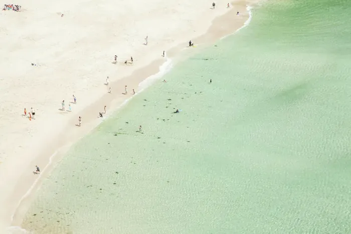 Framed Print : Aerial view of holiday makers on beach, Porthcurno, Cornwall, UK Framed Print : Aerial view of holiday makers on beach, Porthcurno, Cornwall, UK