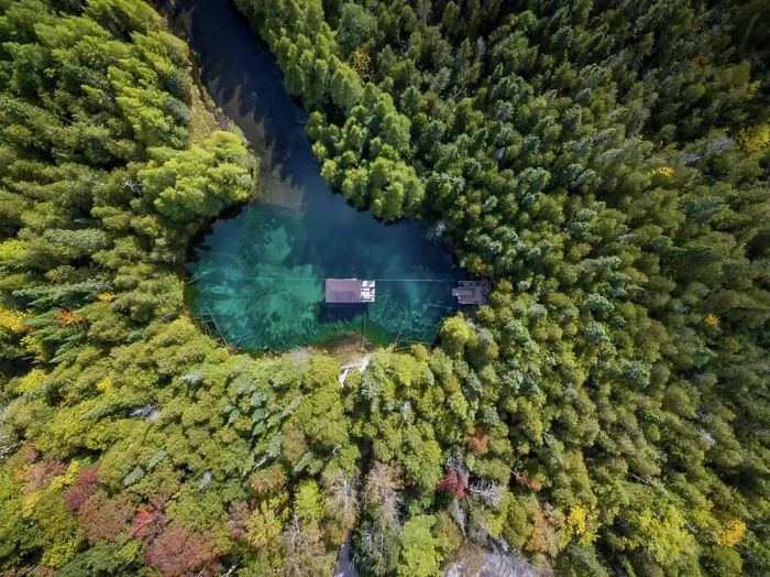 Framed Print : Aerial view of house on Kitch-iti-kipi lake also called The Big Spring, Michigan, USA Framed Print : Aerial view of house on Kitch-iti-kipi lake also called The Big Spring, Michigan, USA