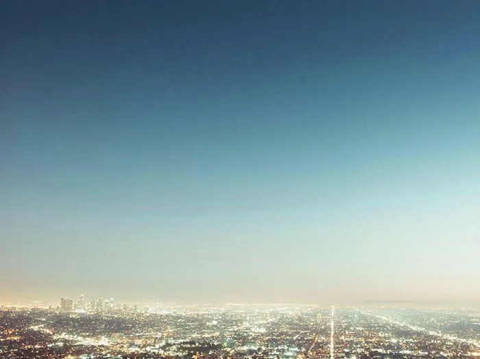 Framed Print : Aerial view of illuminated cityscape against blue sky, Los Angeles, California, USA Framed Print : Aerial view of illuminated cityscape against blue sky, Los Angeles, California, USA