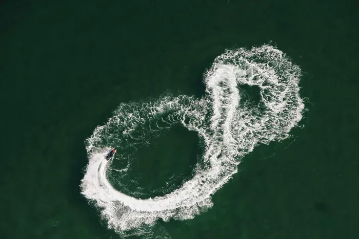 Framed Print : Aerial view of jet skier making figure of eight at sea, Melbourne, Victoria, Australia Framed Print : Aerial view of jet skier making figure of eight at sea, Melbourne, Victoria, Australia
