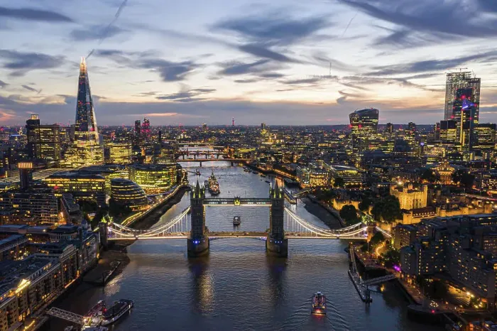 Framed Print : Aerial view of London bridge crossing the river Thames at sunset, United Kingdom