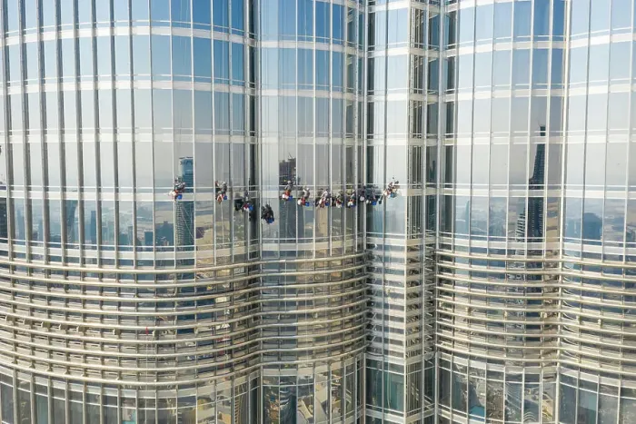Framed Print : Aerial view of men working in the Burj Khalifa building, Dubai, United Arab Emirates Framed Print : Aerial view of men working in the Burj Khalifa building, Dubai, United Arab Emirates