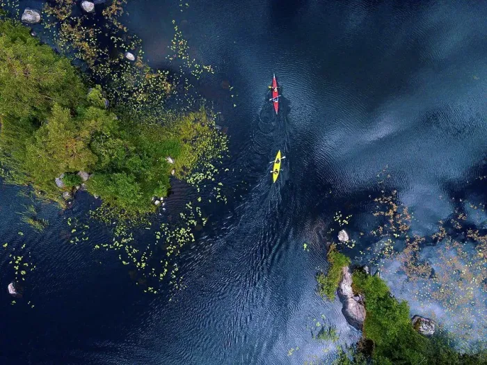 Framed Print : Aerial view of people kayaking in¶ÿVuoksi¶ÿriver Framed Print : Aerial view of people kayaking in¶ÿVuoksi¶ÿriver