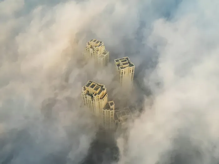Framed Print : Aerial view of skyscrapers in the clouds of Dubai, U.A.E Framed Print : Aerial view of skyscrapers in the clouds of Dubai, U.A.E