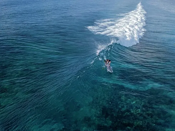 Framed Print : Aerial view of surfer in an ocean Framed Print : Aerial view of surfer in an ocean