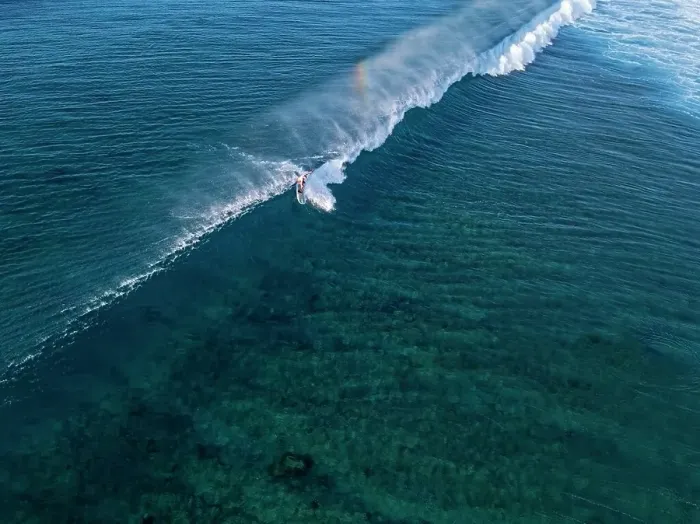 Framed Print : Aerial view of surfer in an ocean