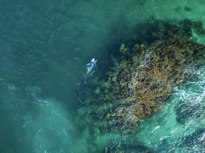 Framed Print : Aerial view of surfer, Sumbawa, Indonesia