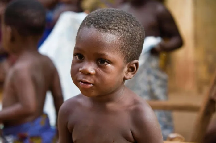 Framed Print : Africa, West Africa, Togo, Atitogan. Close-up portrait of child at voodoo ceremony in small village of Atitogan in Togo Framed Print : Africa, West Africa, Togo, Atitogan. Close-up portrait of child at voodoo ceremony in small village of Atitogan in Togo
