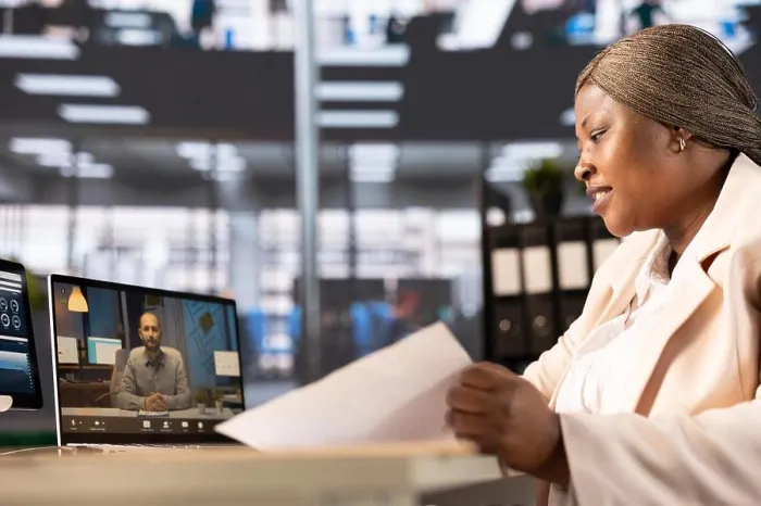 Framed Print : African american businesswoman in online videocall with client Framed Print : African american businesswoman in online videocall with client