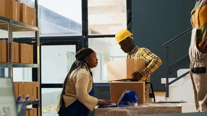 Framed Print : African american people checking quality of goods Framed Print : African american people checking quality of goods
