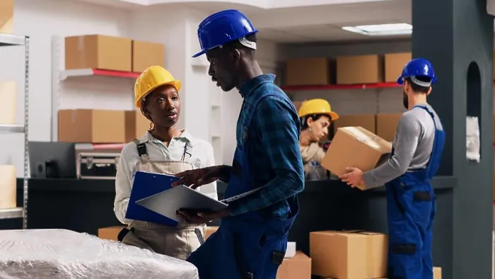 Framed Print : African american people doing quality control in warehouse